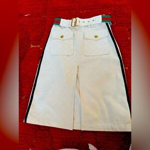 Adidas X Gucci Skirt white with imprinted monogram on skirt.